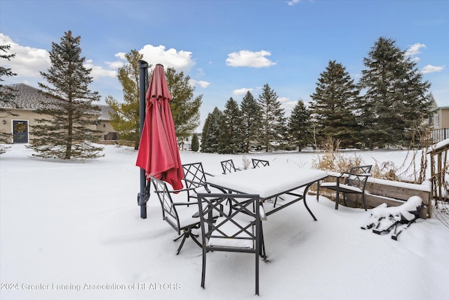 view of snow covered patio