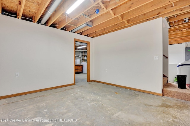 basement featuring electric panel