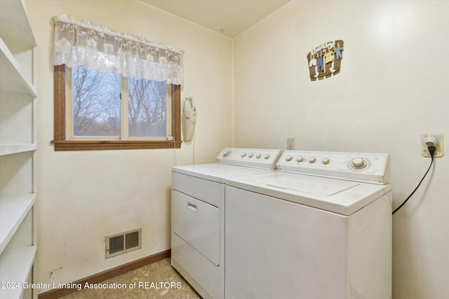 laundry room featuring independent washer and dryer