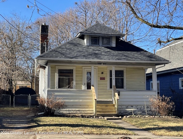 bungalow-style house featuring covered porch