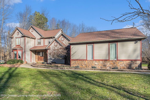 view of front of property with a front lawn