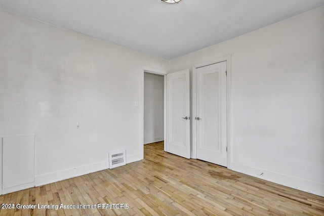 unfurnished bedroom featuring light hardwood / wood-style floors