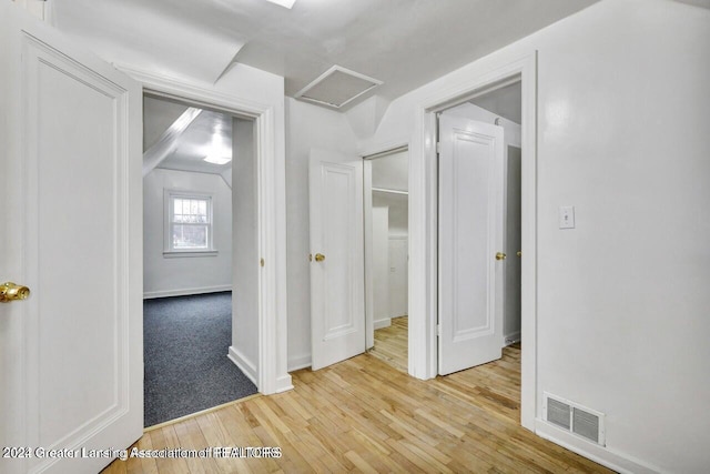 hallway featuring hardwood / wood-style floors