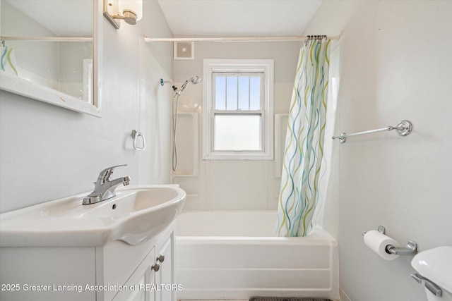 336 S Waverly Rd, Lansing, MI 48917 - bathroom featuring shower / bath combination with curtain, vanity, and toilet