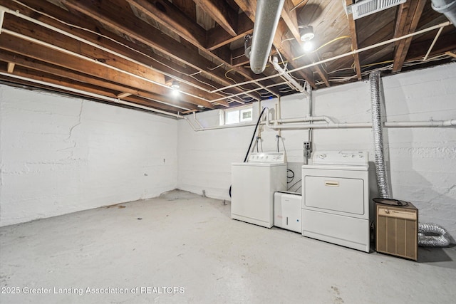 336 S Waverly Rd, Lansing, MI 48917 - below grade area featuring washer and dryer