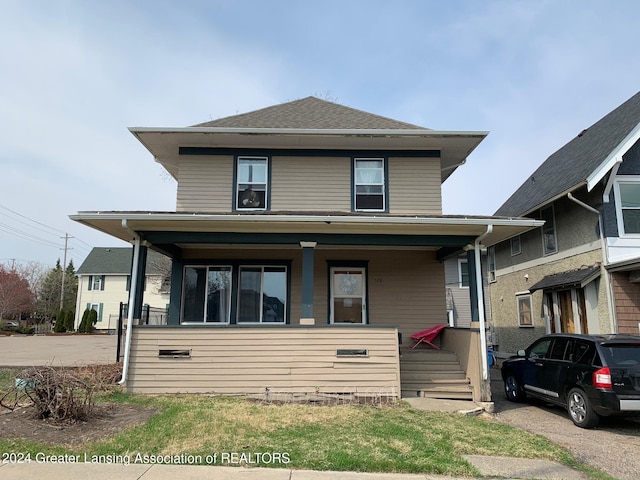 front of property featuring a porch