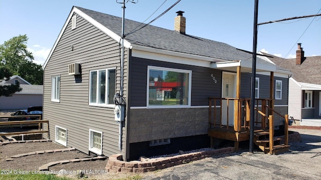 exterior space with a wall unit AC