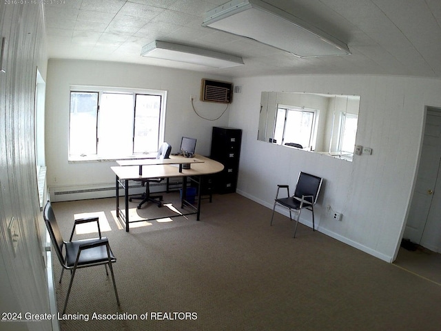 carpeted home office with a wall unit AC and a wealth of natural light