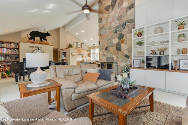 living room featuring ceiling fan, beamed ceiling, and high vaulted ceiling