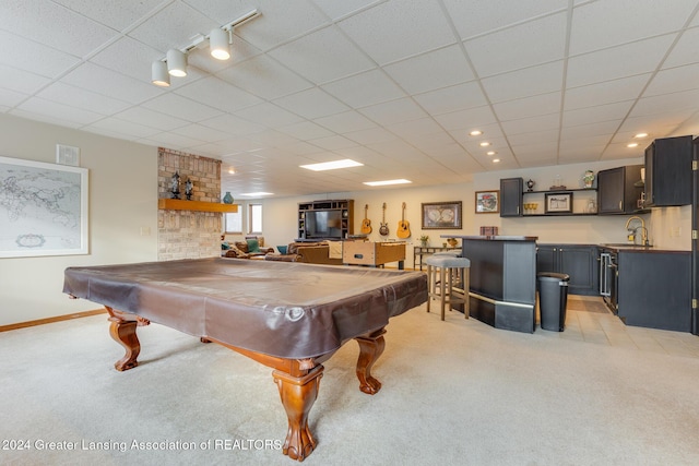 game room with light colored carpet, sink, and billiards