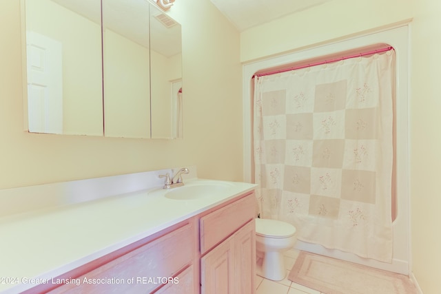 full bathroom featuring toilet, shower / tub combo, vanity, and tile patterned floors