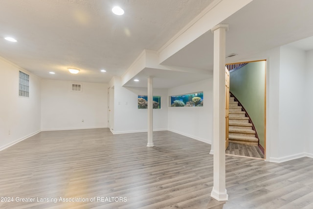 basement with light wood-type flooring