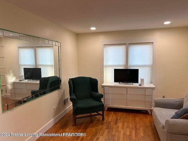 sitting room featuring hardwood / wood-style floors