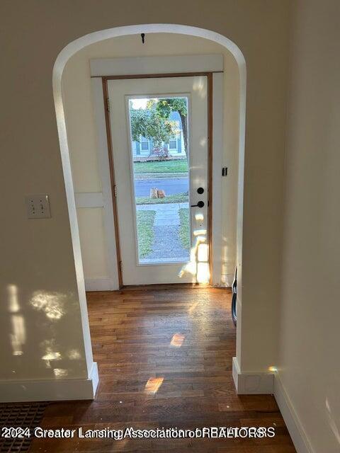 doorway featuring dark hardwood / wood-style flooring