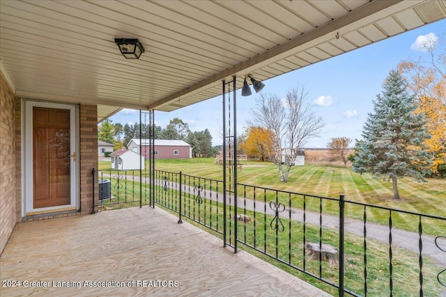 view of patio with central AC unit