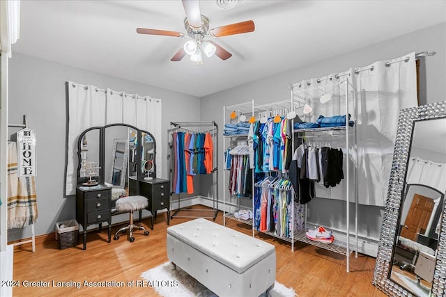 spacious closet featuring ceiling fan and hardwood / wood-style floors