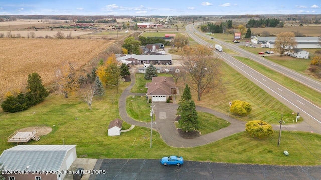 birds eye view of property featuring a rural view