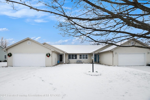 single story home with a garage