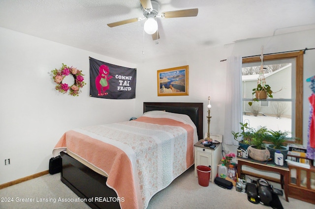 bedroom featuring carpet and ceiling fan