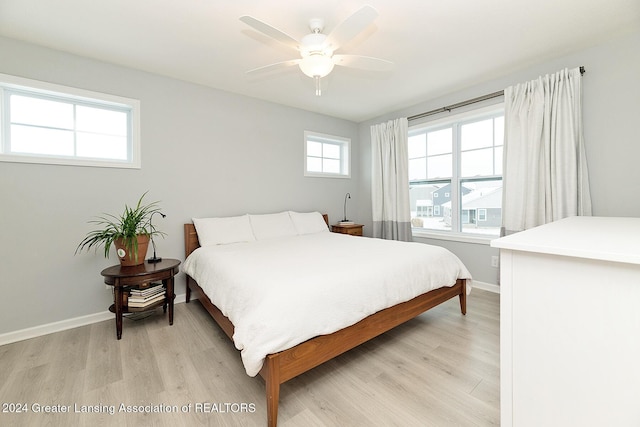 bedroom featuring ceiling fan and light wood-type flooring