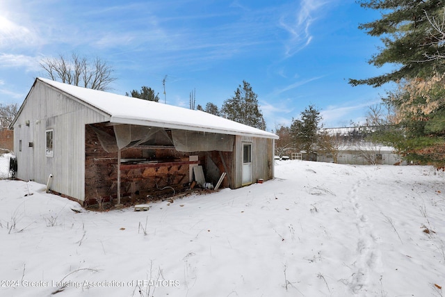 view of snow covered property