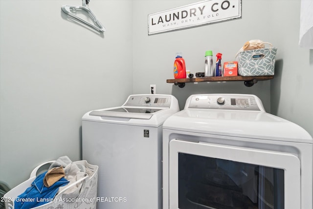 laundry area with independent washer and dryer