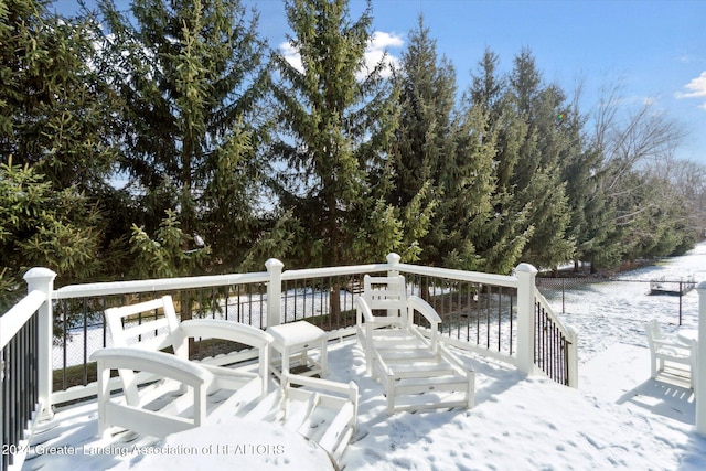 view of snow covered deck