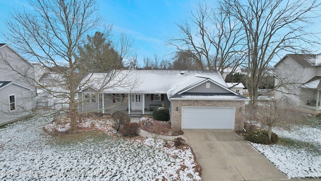 ranch-style house featuring a garage