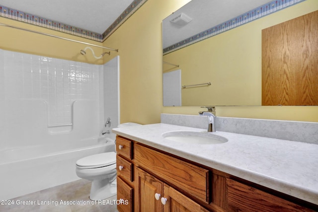 full bathroom featuring bathing tub / shower combination, tile patterned floors, vanity, and toilet