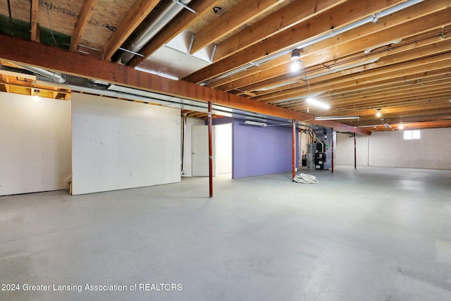 basement featuring heating unit