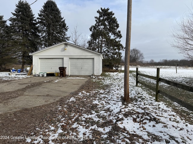 view of snow covered garage