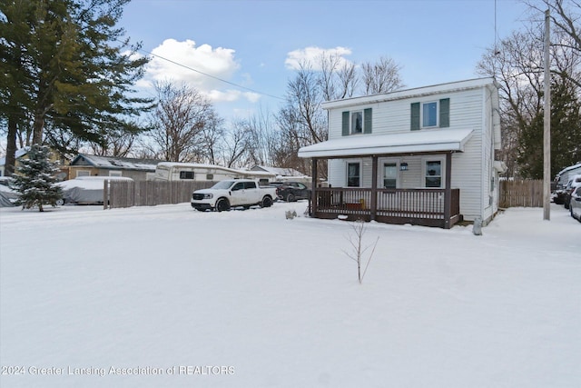 view of front property featuring covered porch