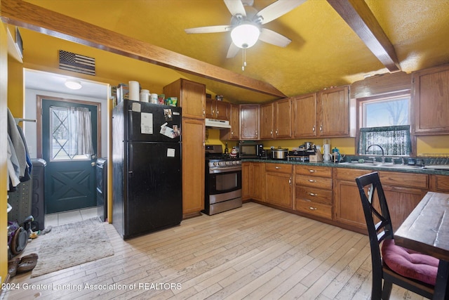 kitchen with black appliances, ceiling fan, beam ceiling, sink, and light hardwood / wood-style flooring