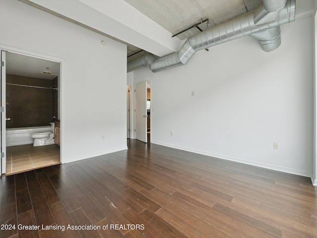 interior space with dark hardwood / wood-style floors