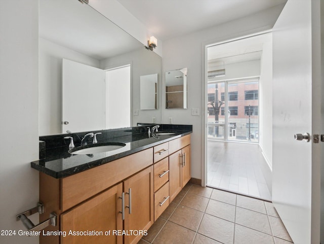 bathroom featuring tile patterned floors and vanity