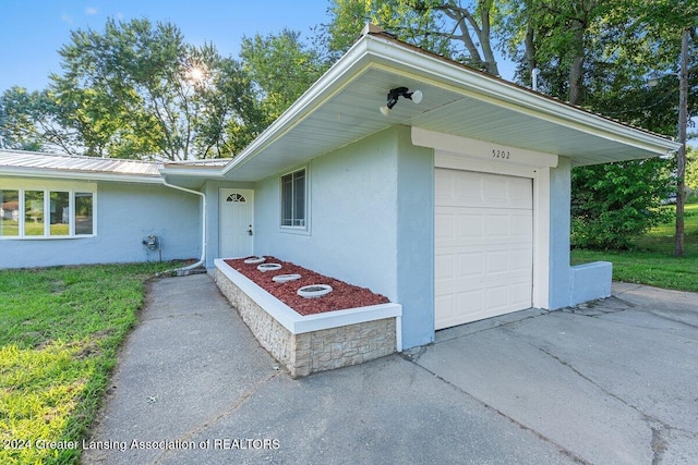 property entrance featuring a garage