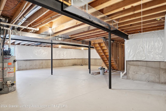 basement featuring water heater