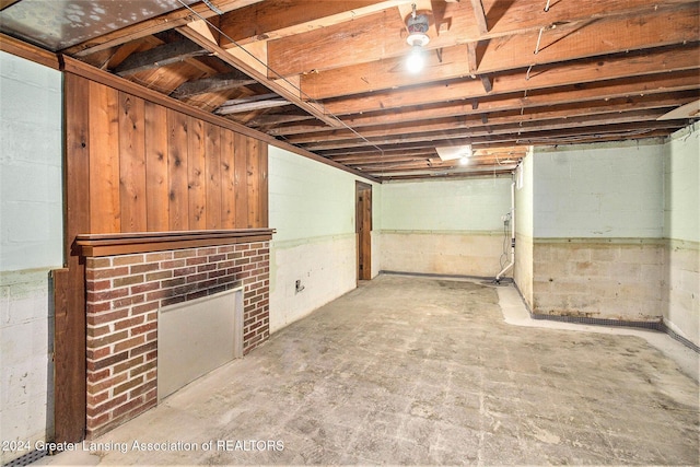 basement with a fireplace