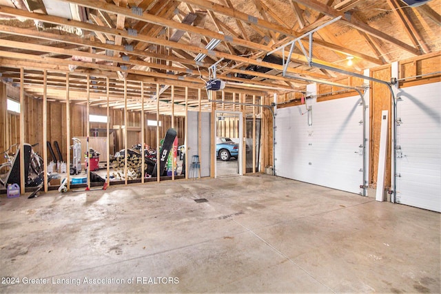 garage featuring a garage door opener