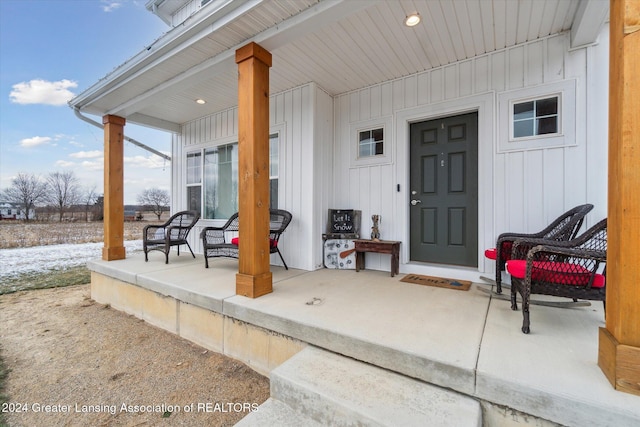 entrance to property with a porch