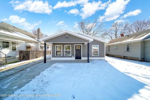 view of snow covered property