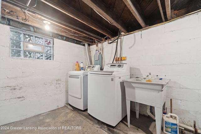 laundry room with washer and dryer