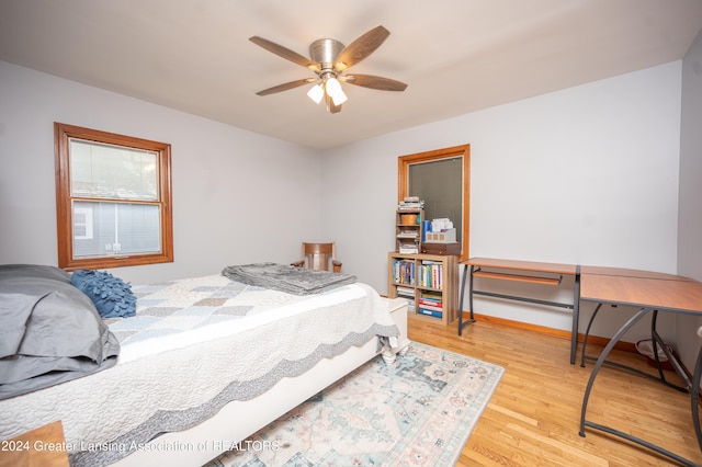 bedroom featuring ceiling fan and light hardwood / wood-style flooring