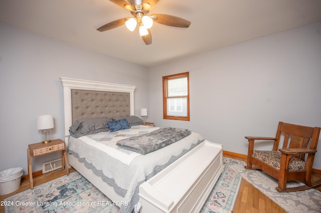 bedroom featuring ceiling fan and light wood-type flooring