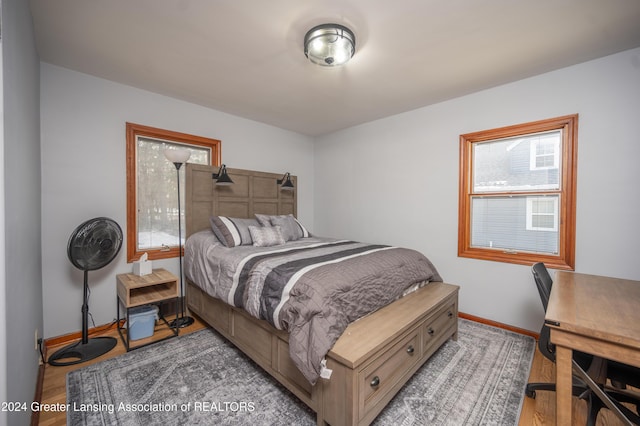 bedroom featuring wood-type flooring