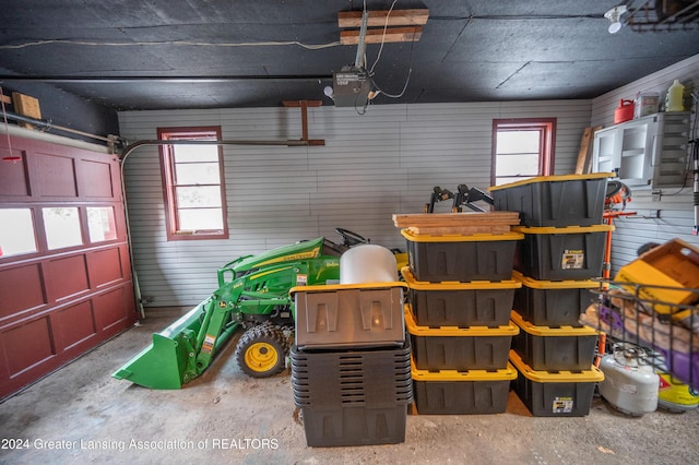 garage featuring a garage door opener