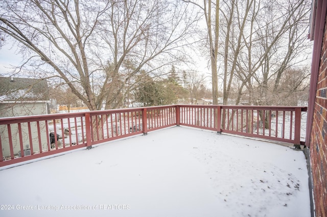 view of snow covered deck