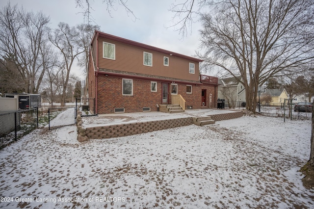 view of snow covered property