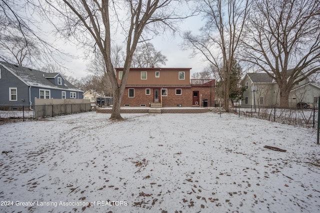 view of snow covered property