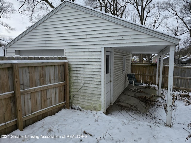 view of snow covered property